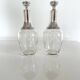 Pair of crystal and silver decanters - early 20th century