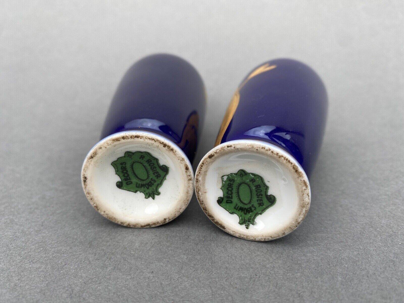 Pair of 1900 Limoges vases with blue background and gold highlights, R. Rosier decorations