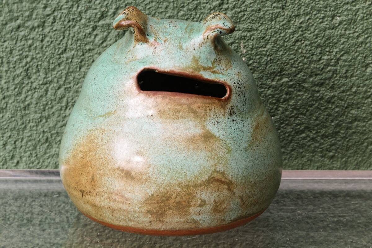 Glazed terracotta owl money box, signed.