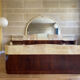 Bed with integrated bedside in rosewood and parchment, art deco period, twentieth century