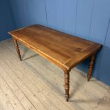 Antique cherry wood dining table from France.