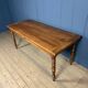 Antique cherry wood dining table from France.