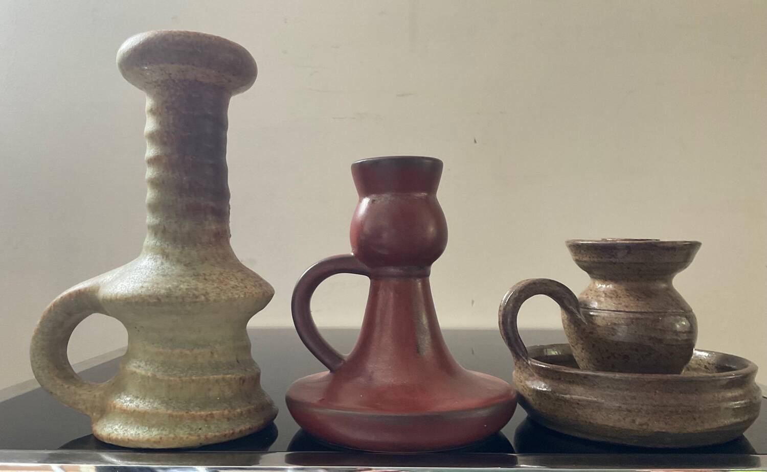 Trio of candlesticks with handles from the 60s-70s