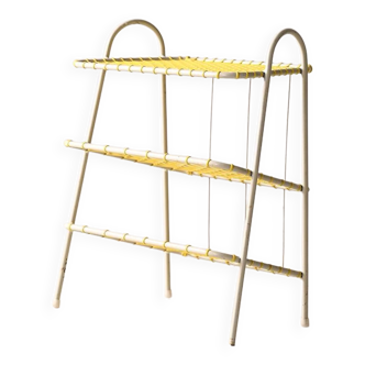 Metal and yellow rubber magazine rack