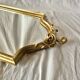 Antique Deknudt mirror in golden resin - 70 x 34 cm