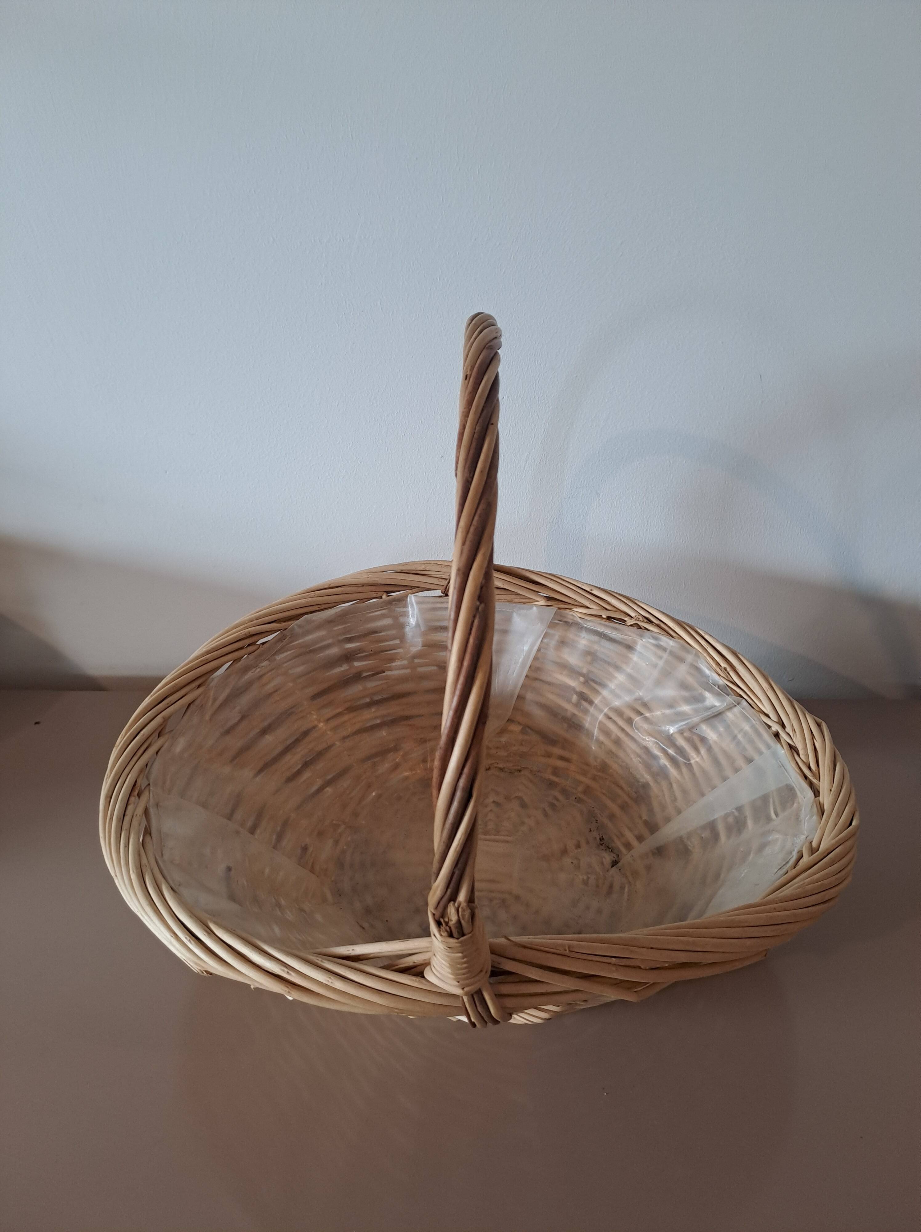 Natural wicker basket with twisted handle – vintage decorative basket