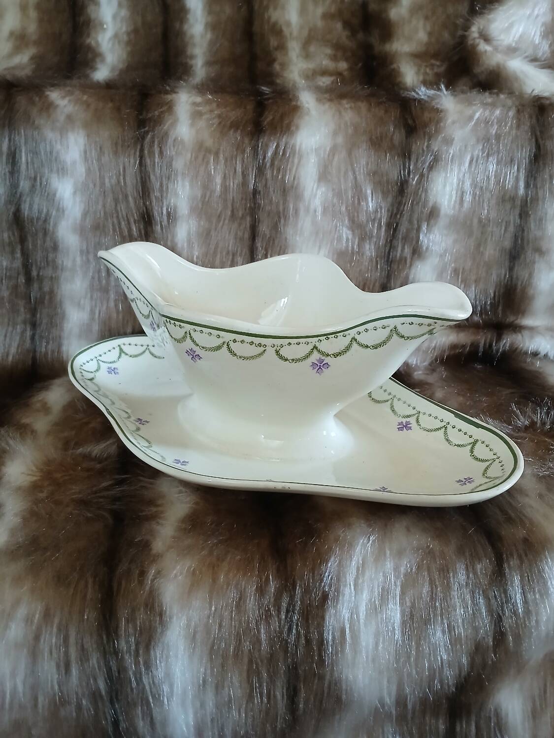 Antique sauce boat in Longwy ironstone.