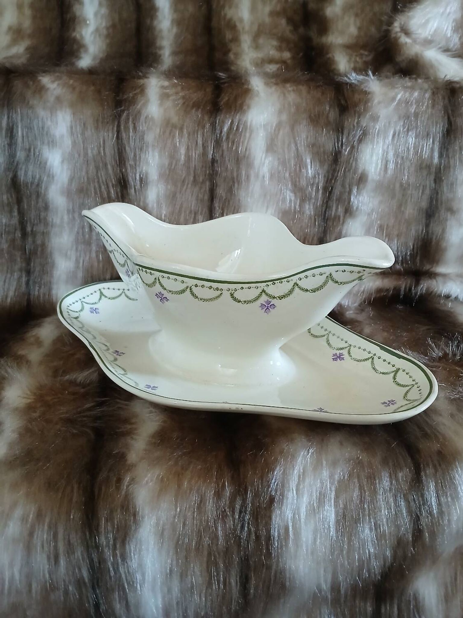 Antique sauce boat in Longwy ironstone.