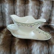 Antique sauce boat in Longwy ironstone.
