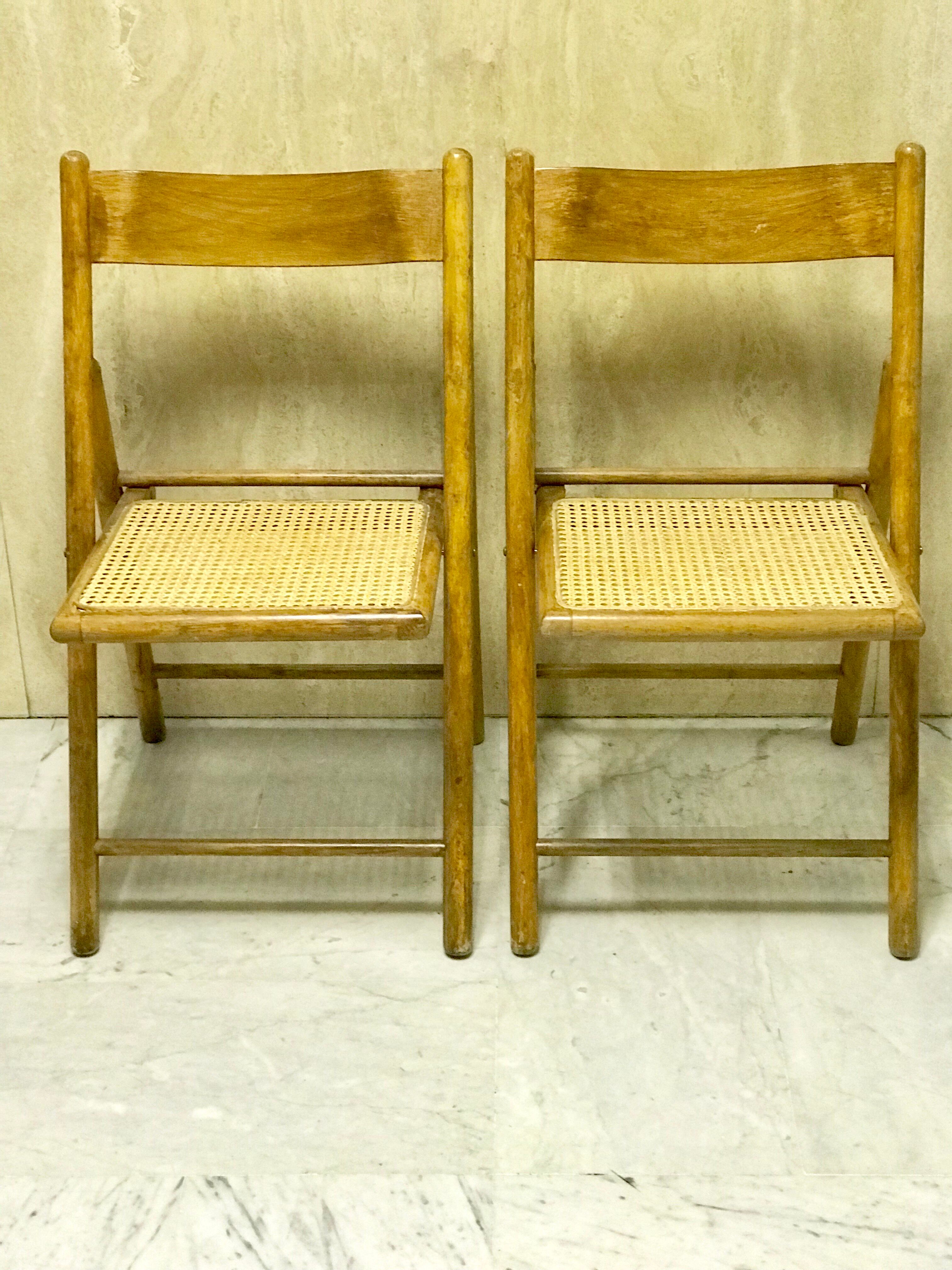Duo of canned folding chairs