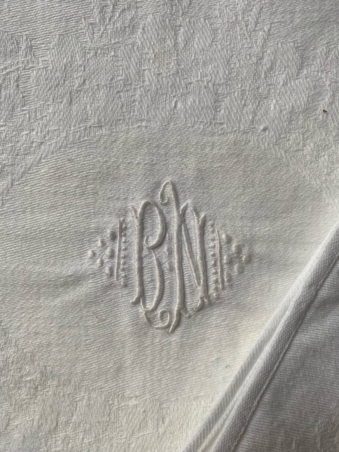 3 white tea towels in damask cotton thread with BN monogram.
