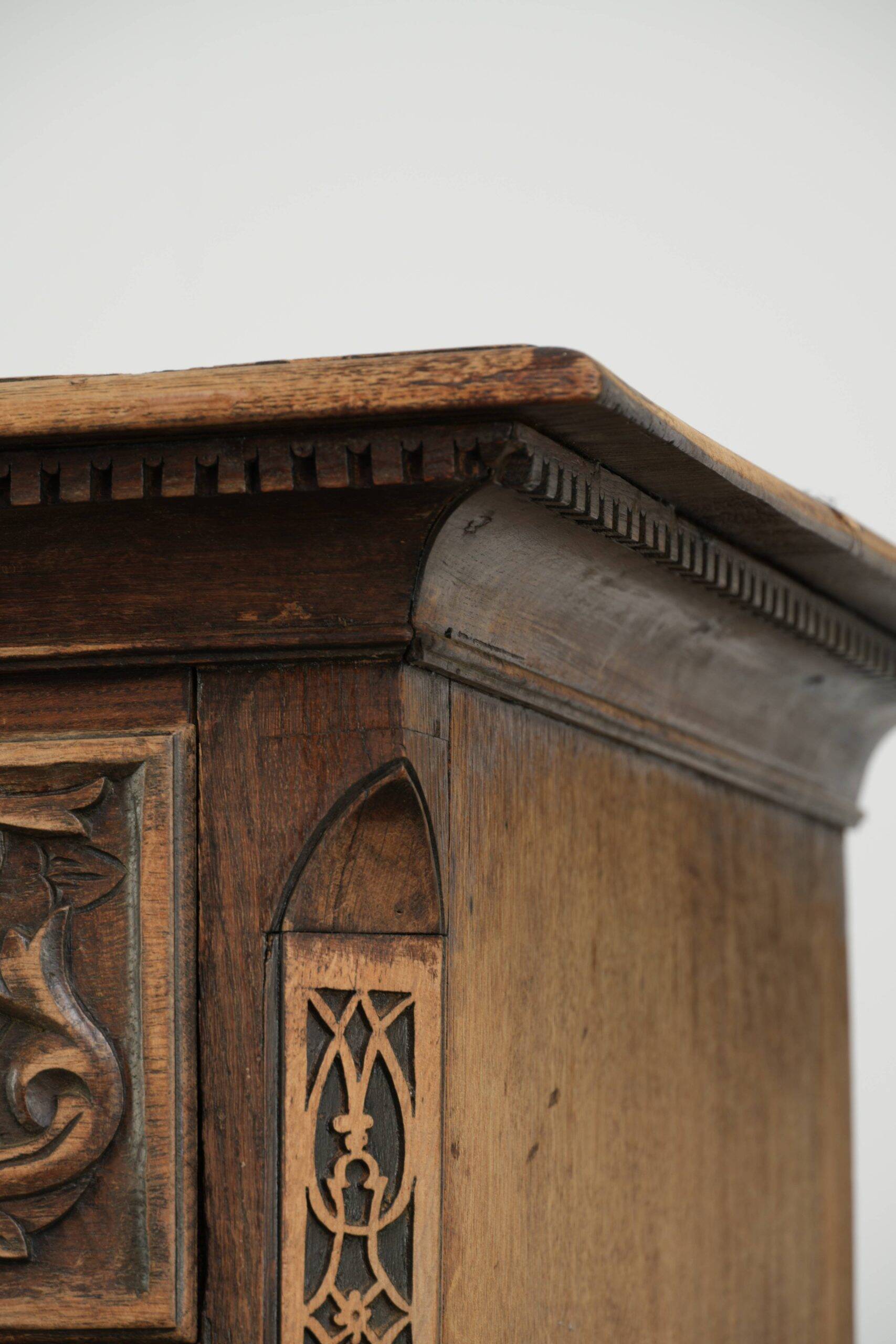 Richly carved English oak chest of drawers from the 18th century