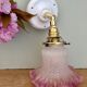 Vintage tulip-shaped lamp in frosted white and pink glass.