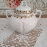 White porcelain sugar bowl decoration in relief and green and gold frieze