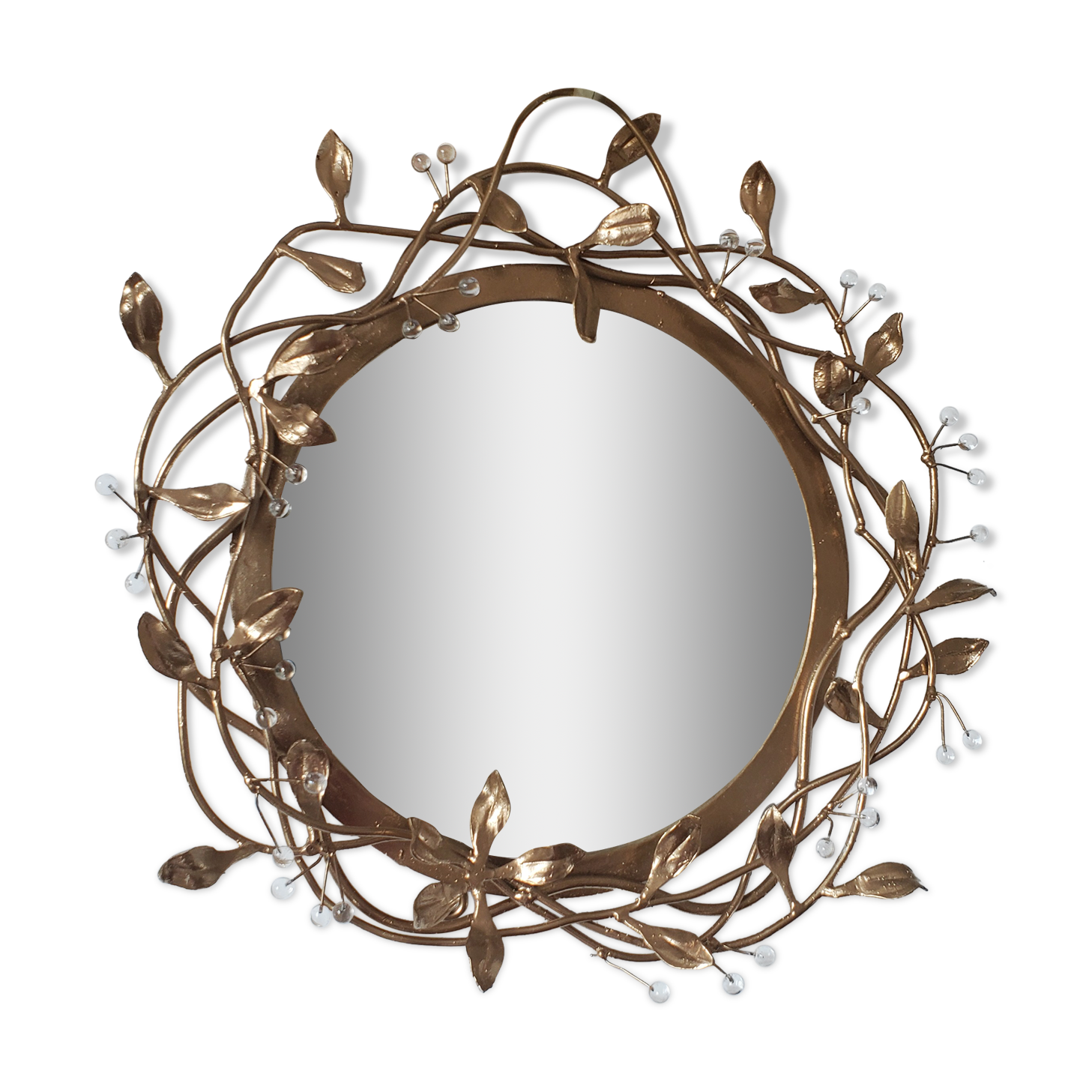 Round mirror in gilded wrought iron and leaves