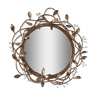 Miroir rond en fer forgé doré et feuilles