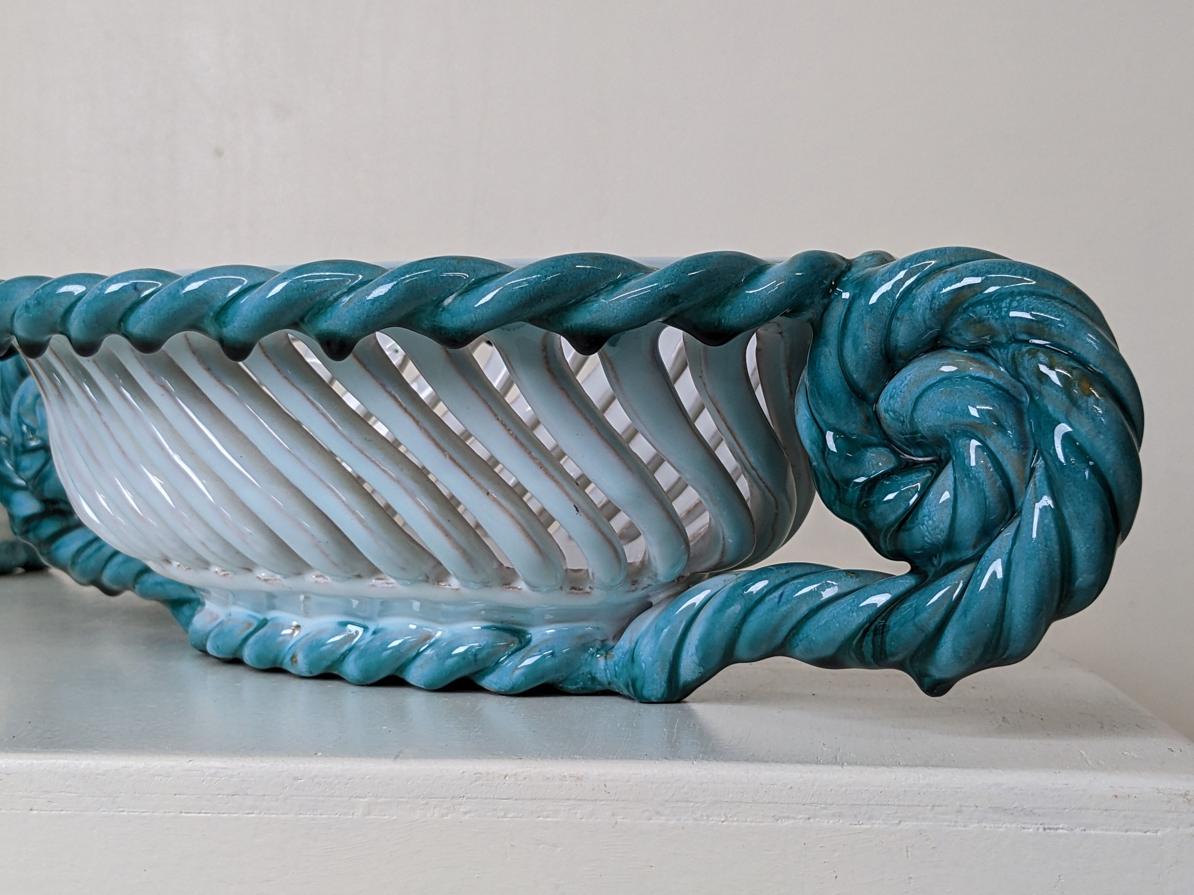 Set of 2 twisted earthenware fruit baskets by Sainte Radegonde, 50s