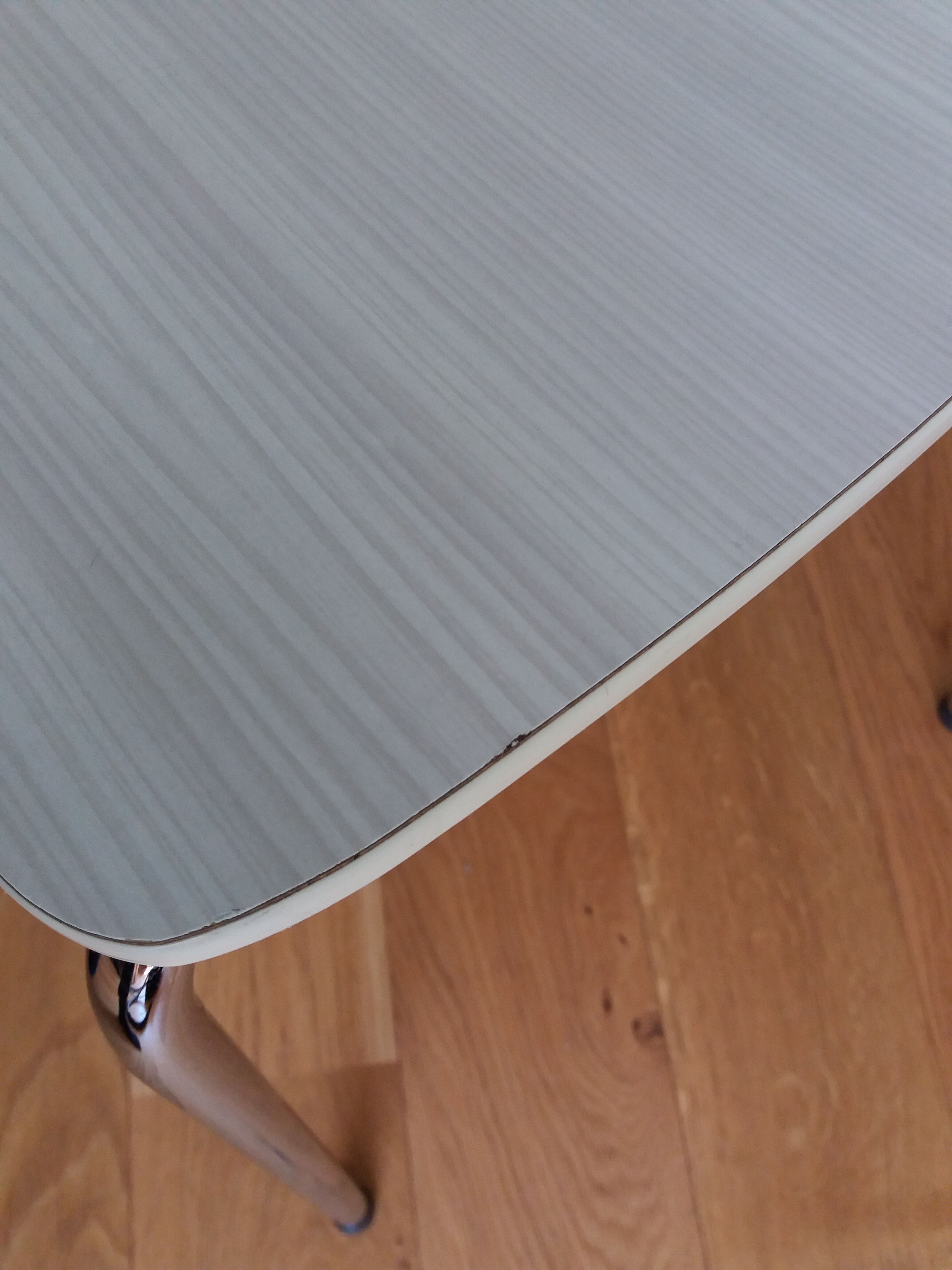 Chrome metal chair and formica white striped gray