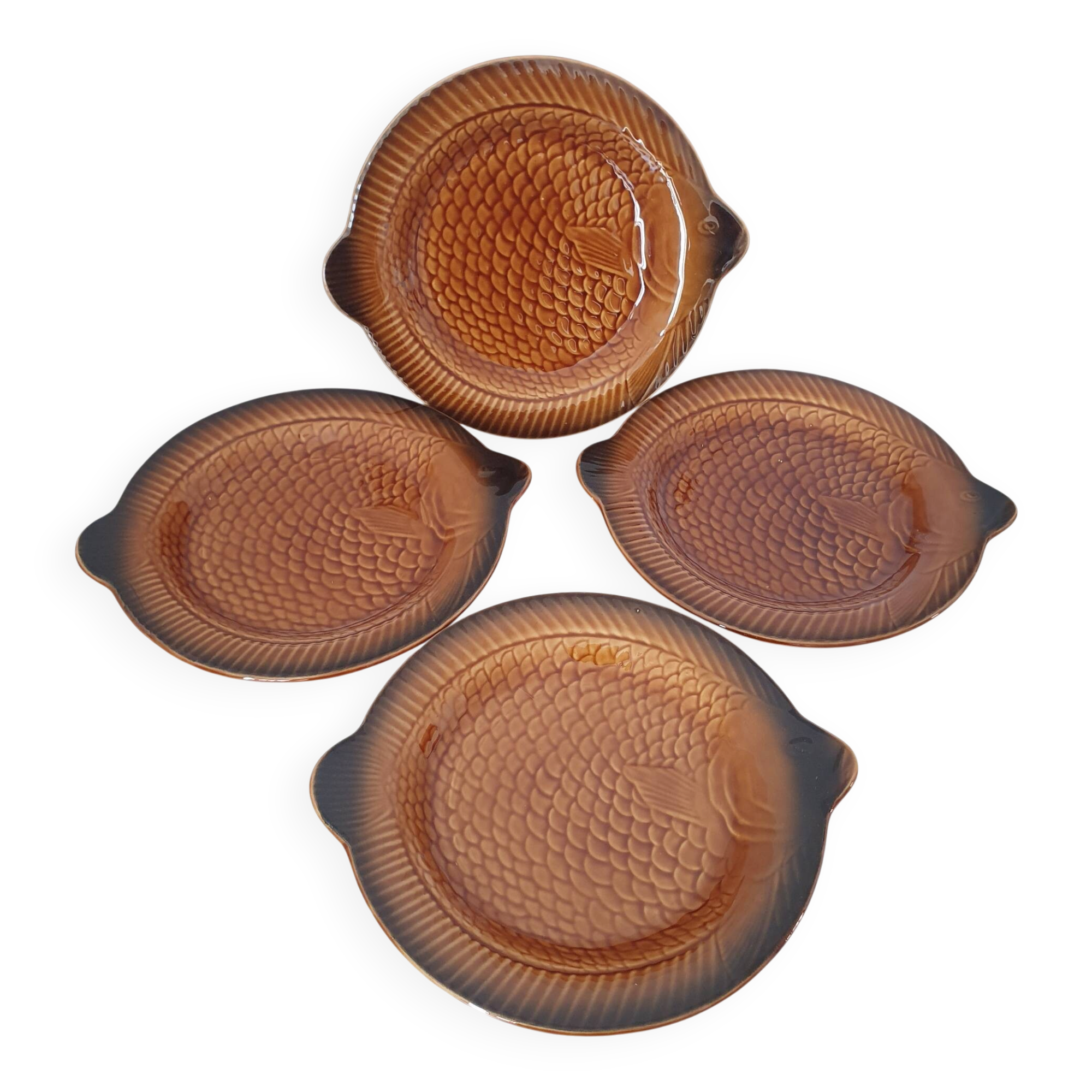 Sarreguemines / 4 ceramic fish-shaped plates in Barb porcelain.