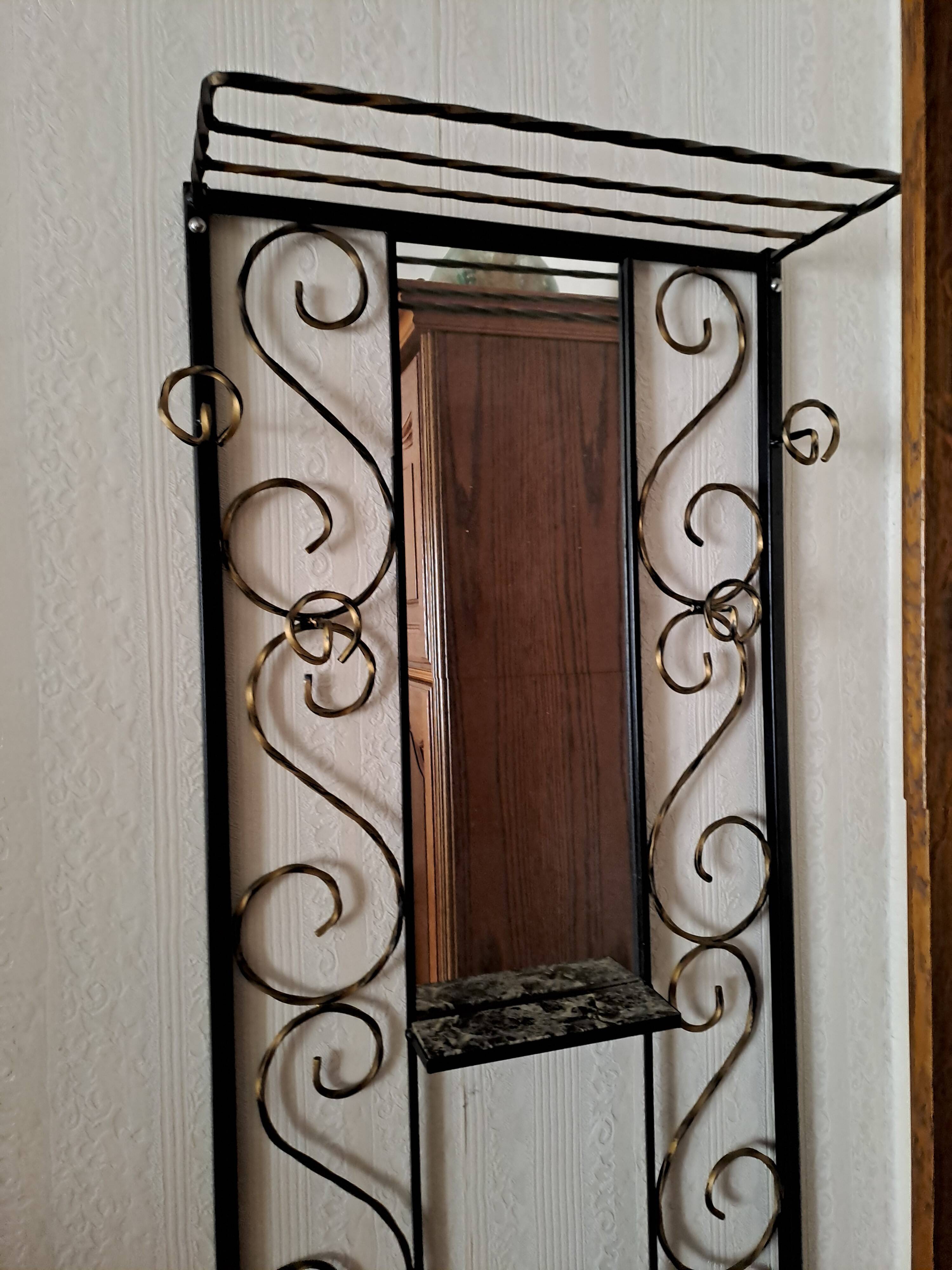 Vintage wrought iron coat rack