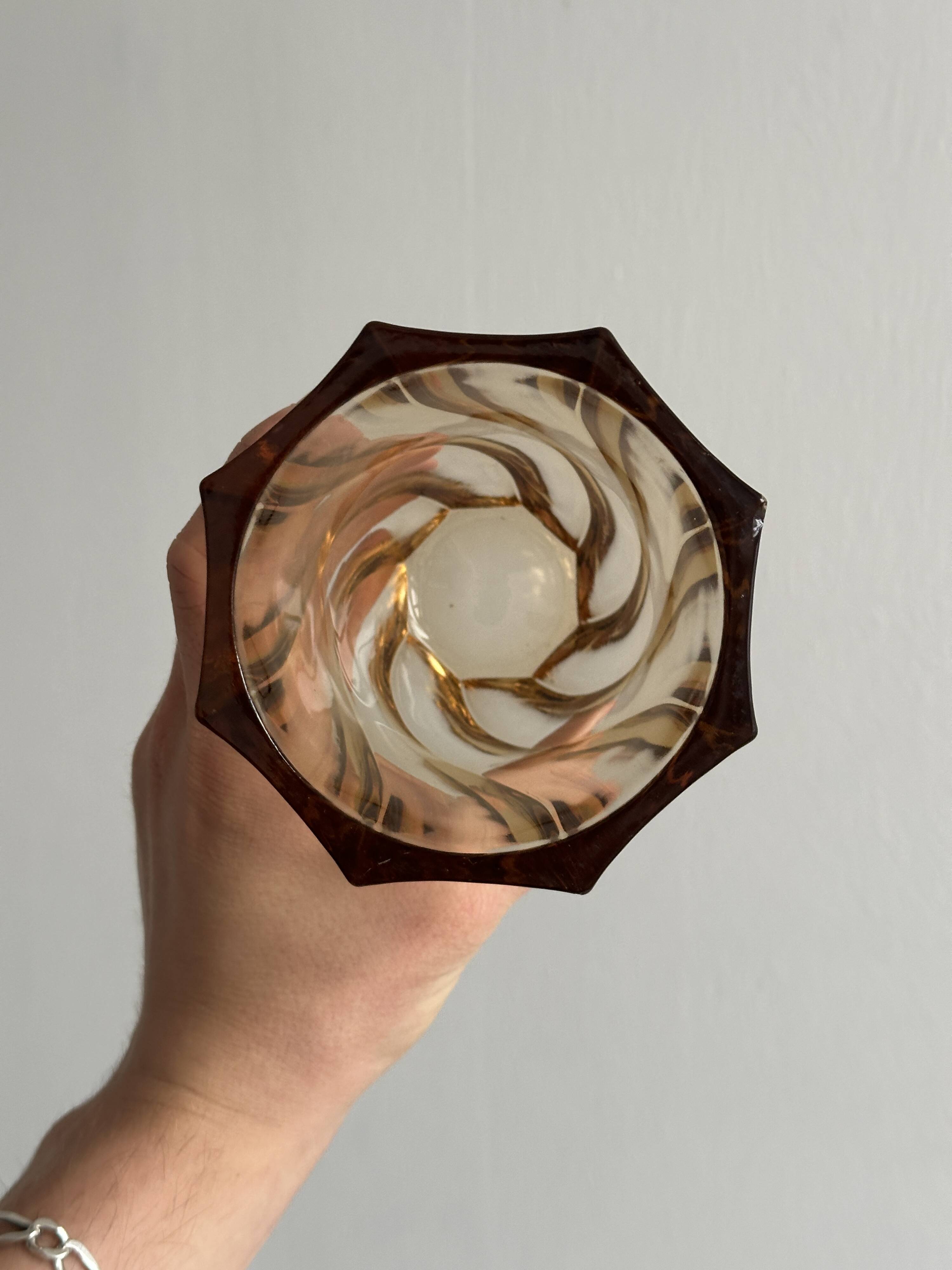 Small translucent pink twisted glass vase