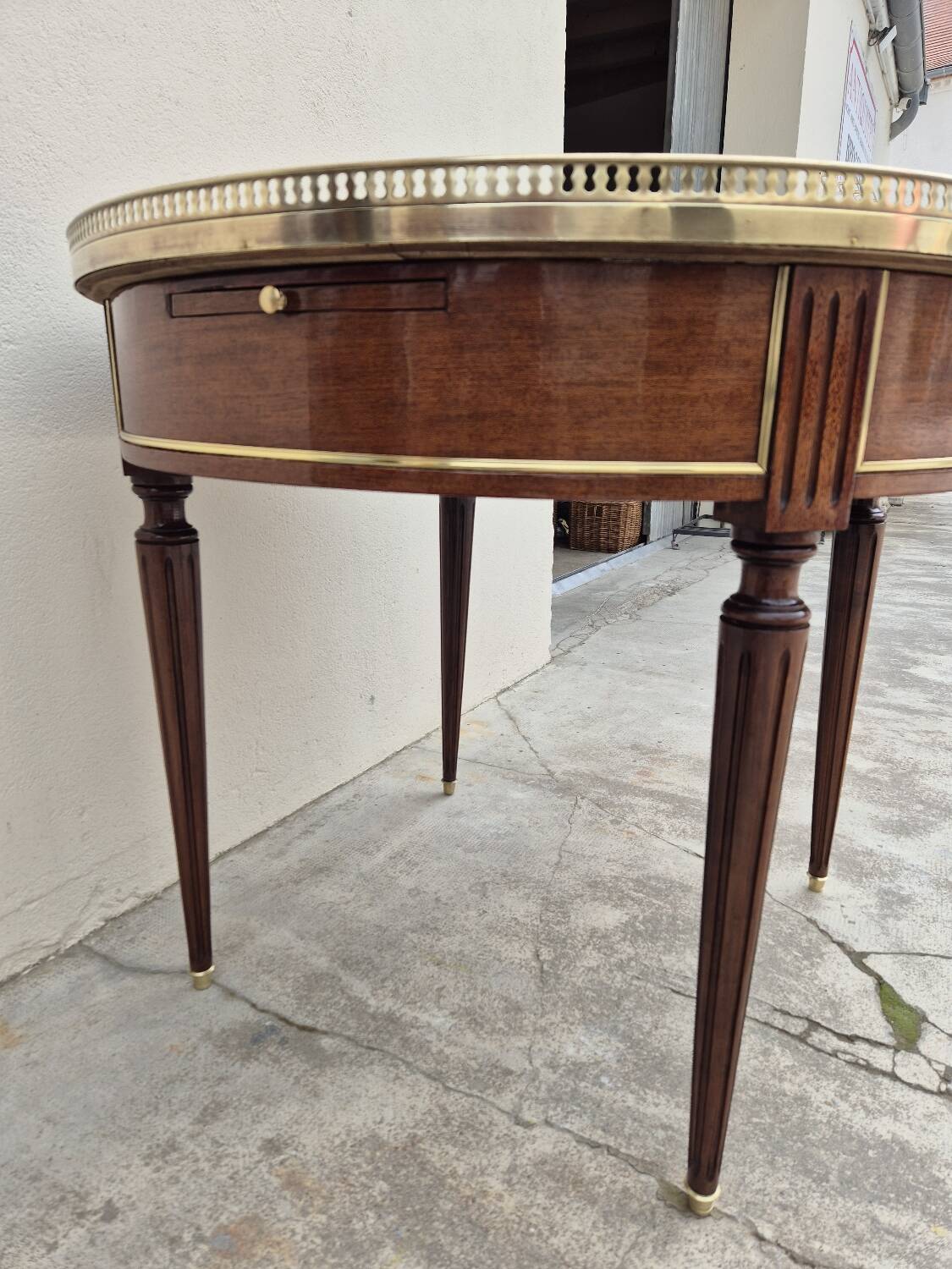 Louis XVI style mahogany bouillotte table in marquetry and bronze