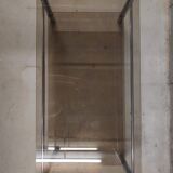 Yves Boutboul's vintage coffee table in tempered glass and chrome metal tubes from the 70s