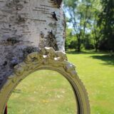 Oval mirror with golden knot