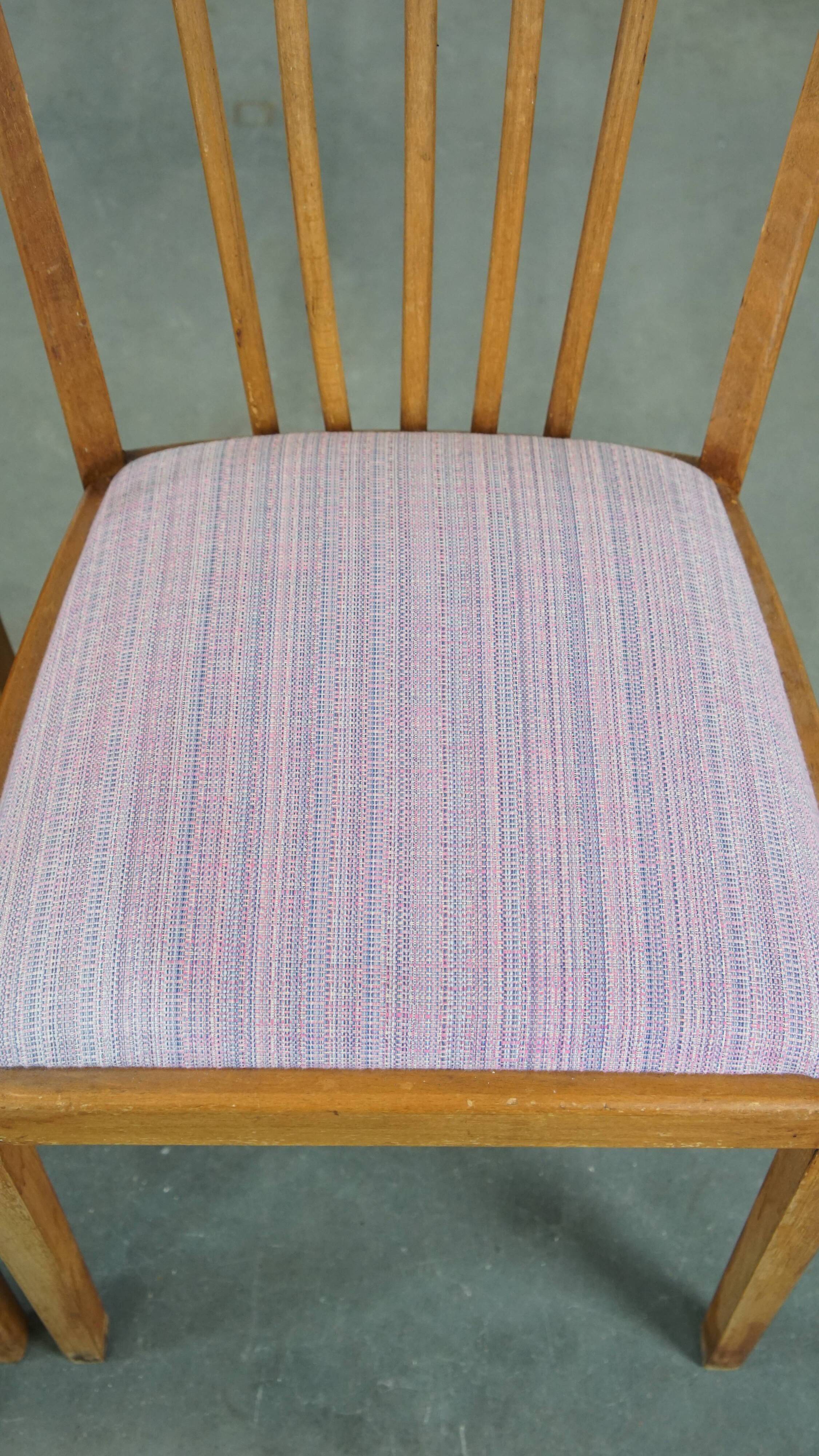 Set of 8 vintage Danish design dining chairs from the 1970s with light purple fabric seats