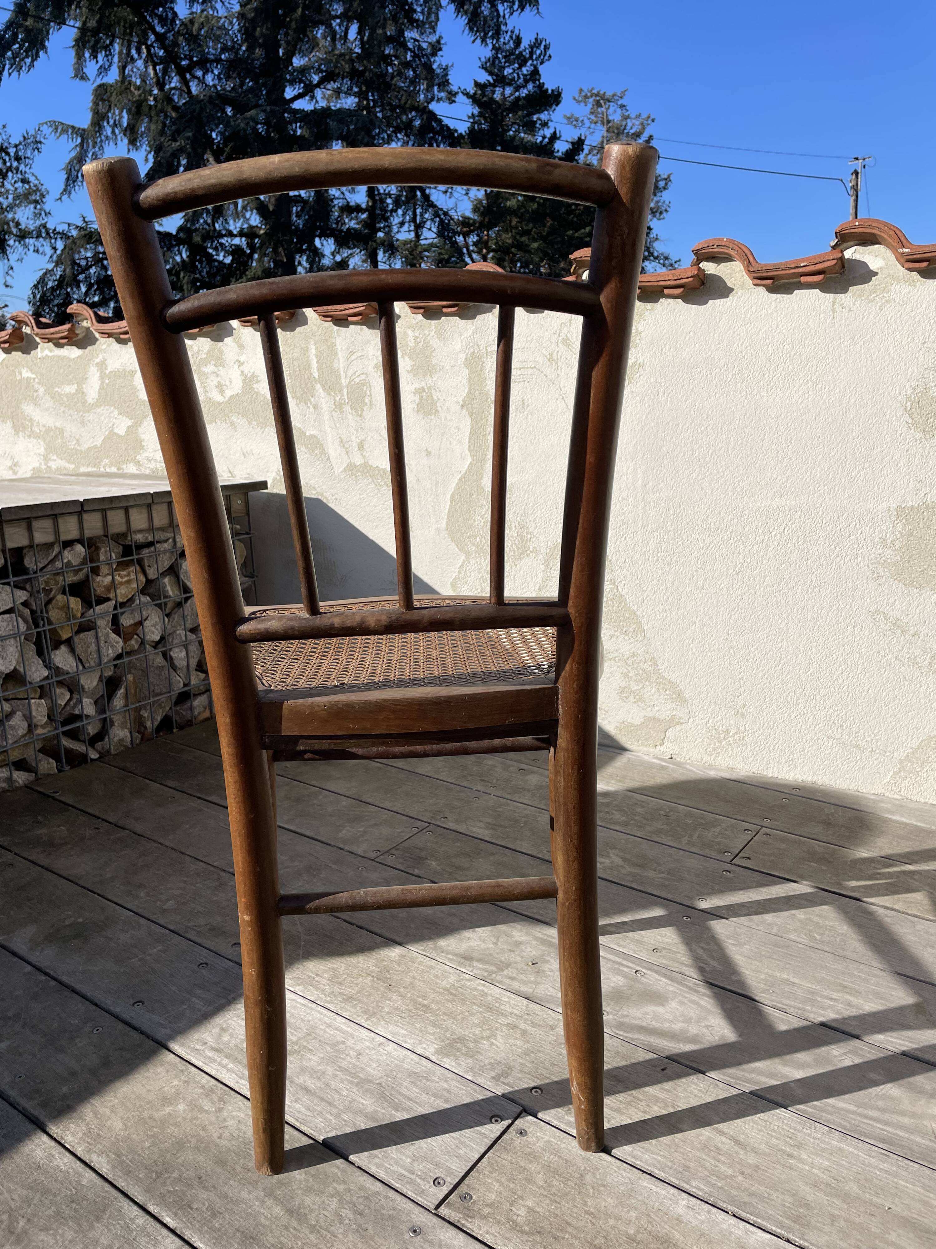 Wooden and cane chair