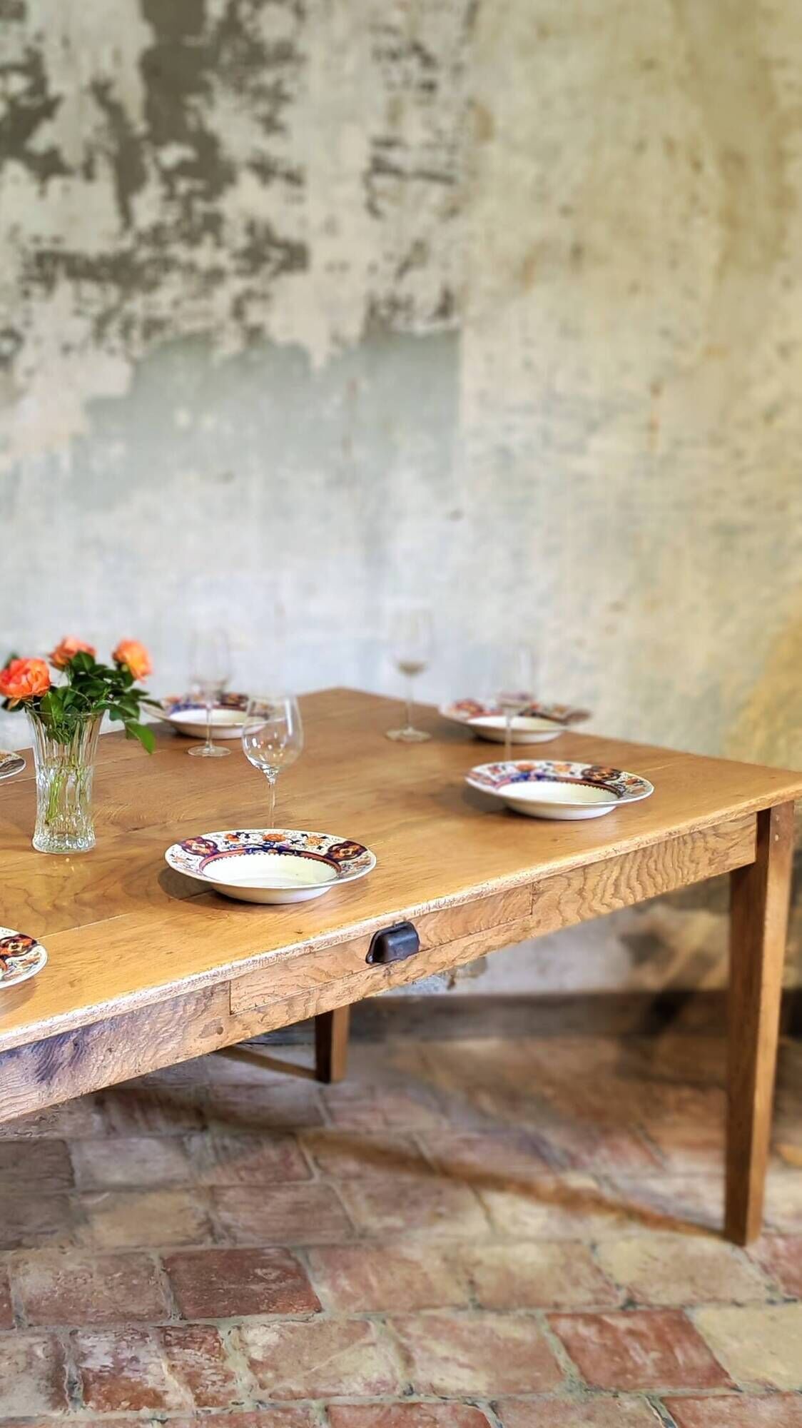 Large authentic farmhouse table made of solid French oak.