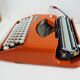 Hermes Baby orange typewriter