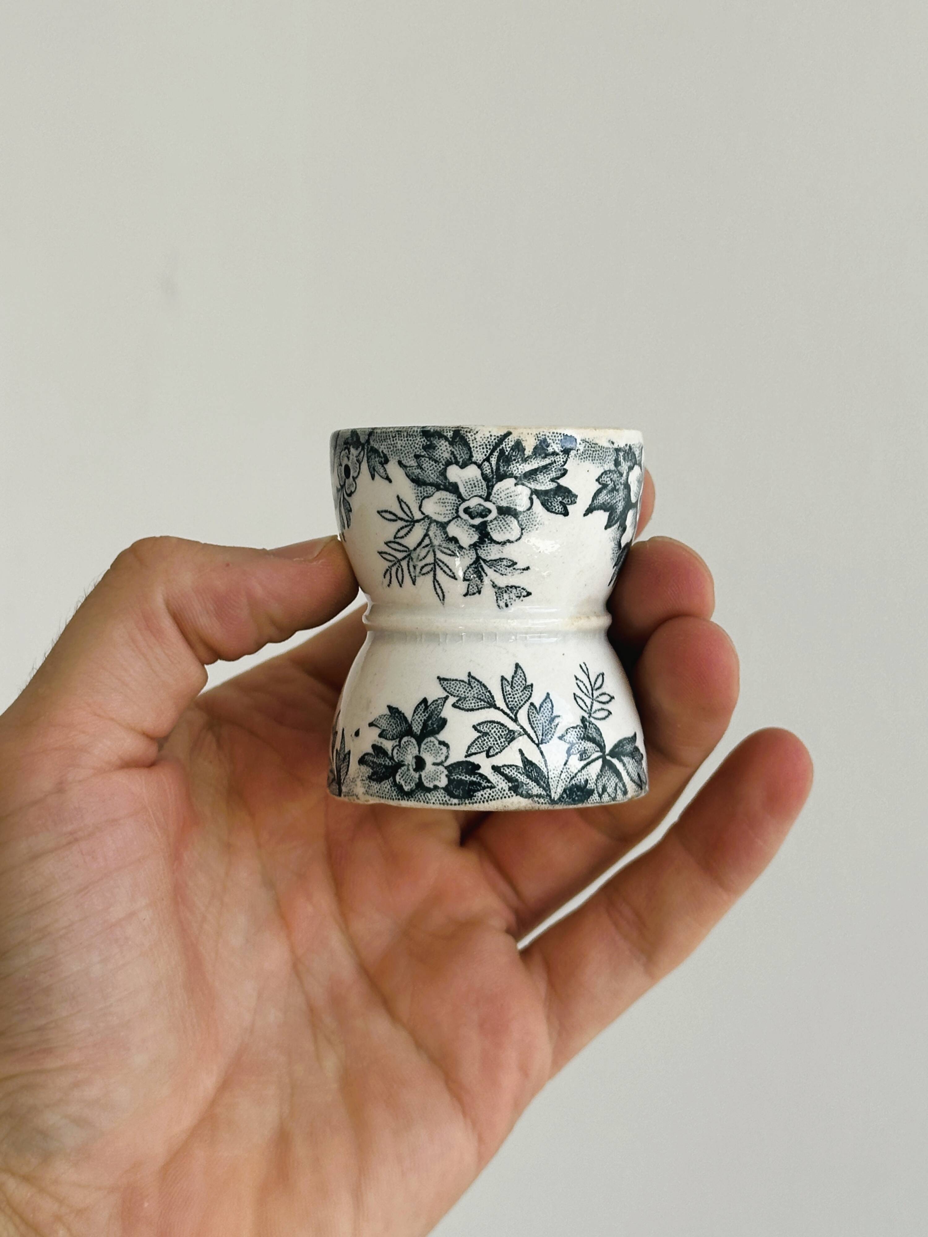 Set of 4 antique earthenware egg cups