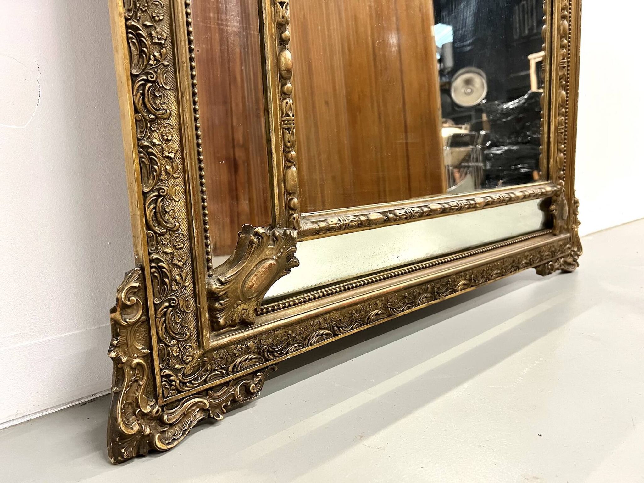 Large antique pediment mirror with mouldings.