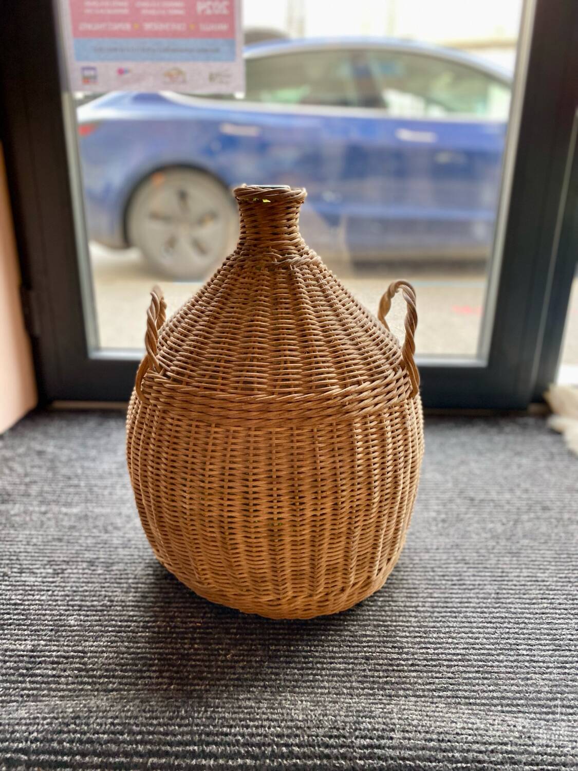 Old rattan demijohn