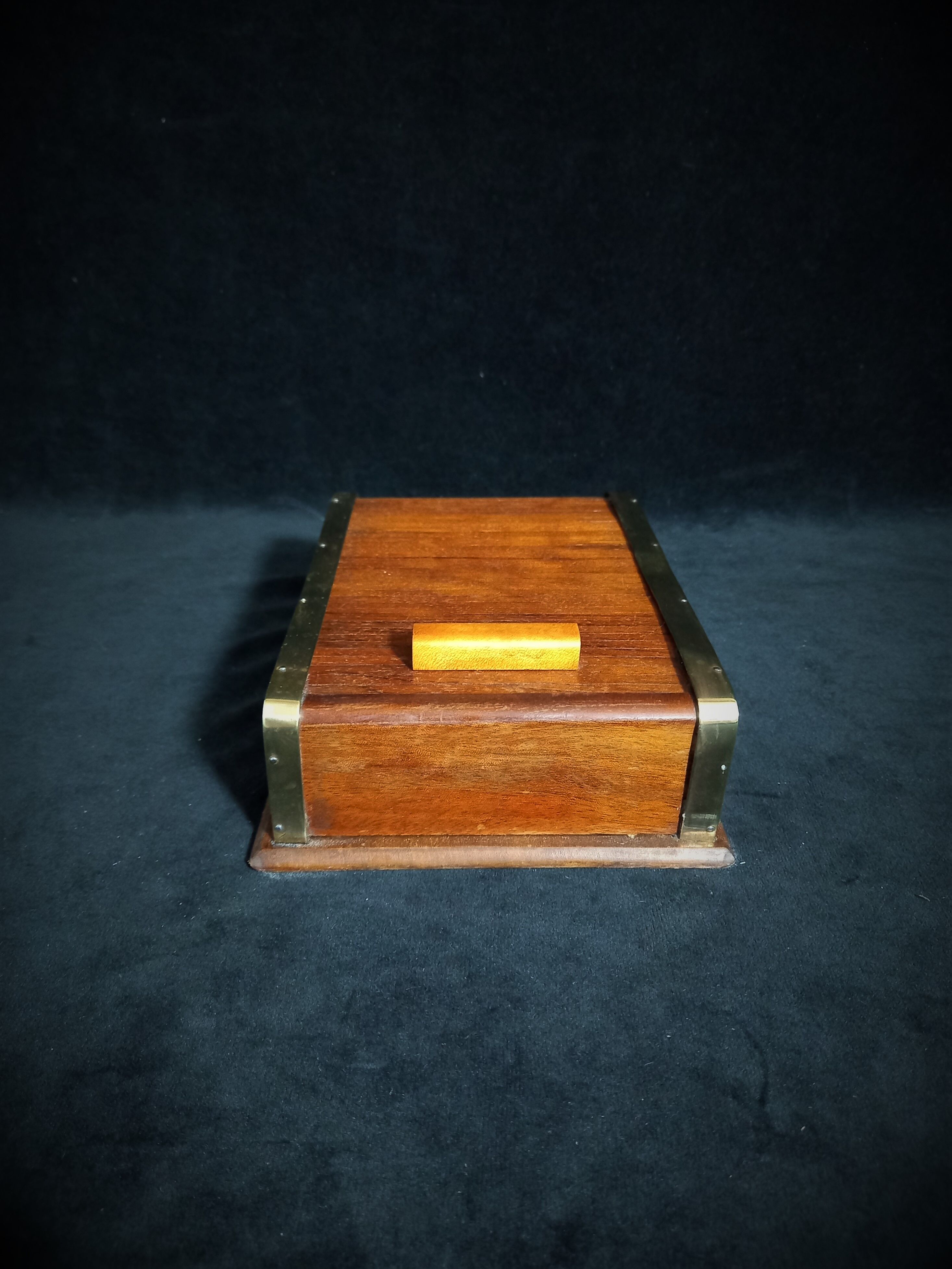 Art deco cigar box with sliding lid and brass finishes