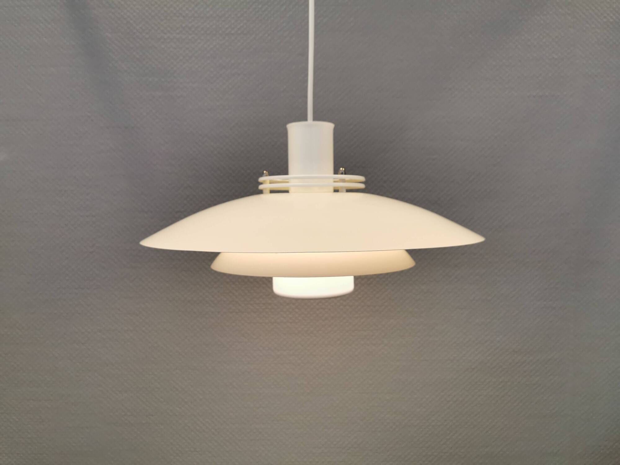 FormLight hanging lamp with multiple layers of shades, a Danish quality product from the 80s.