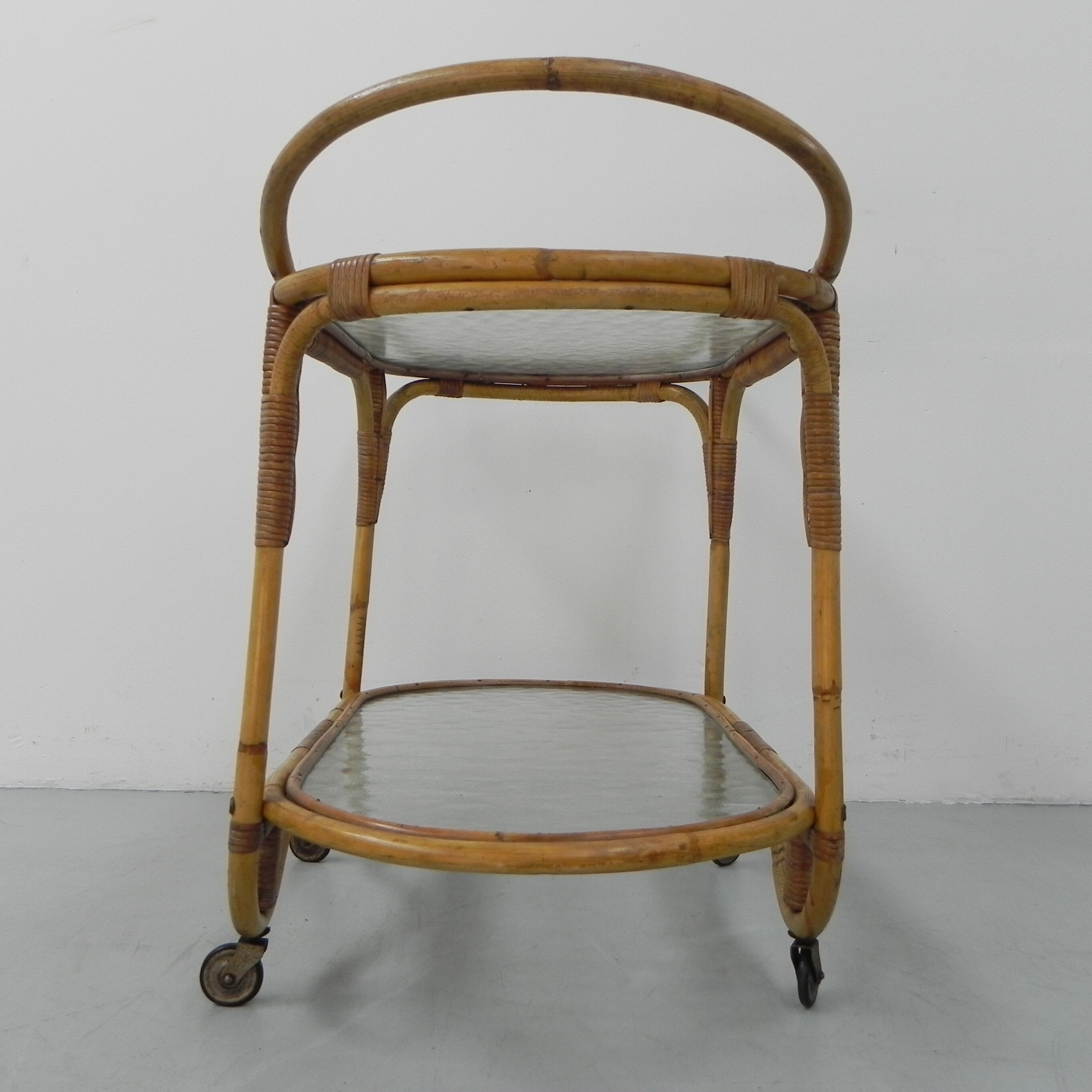 Bamboo, rattan serving trolley on castors