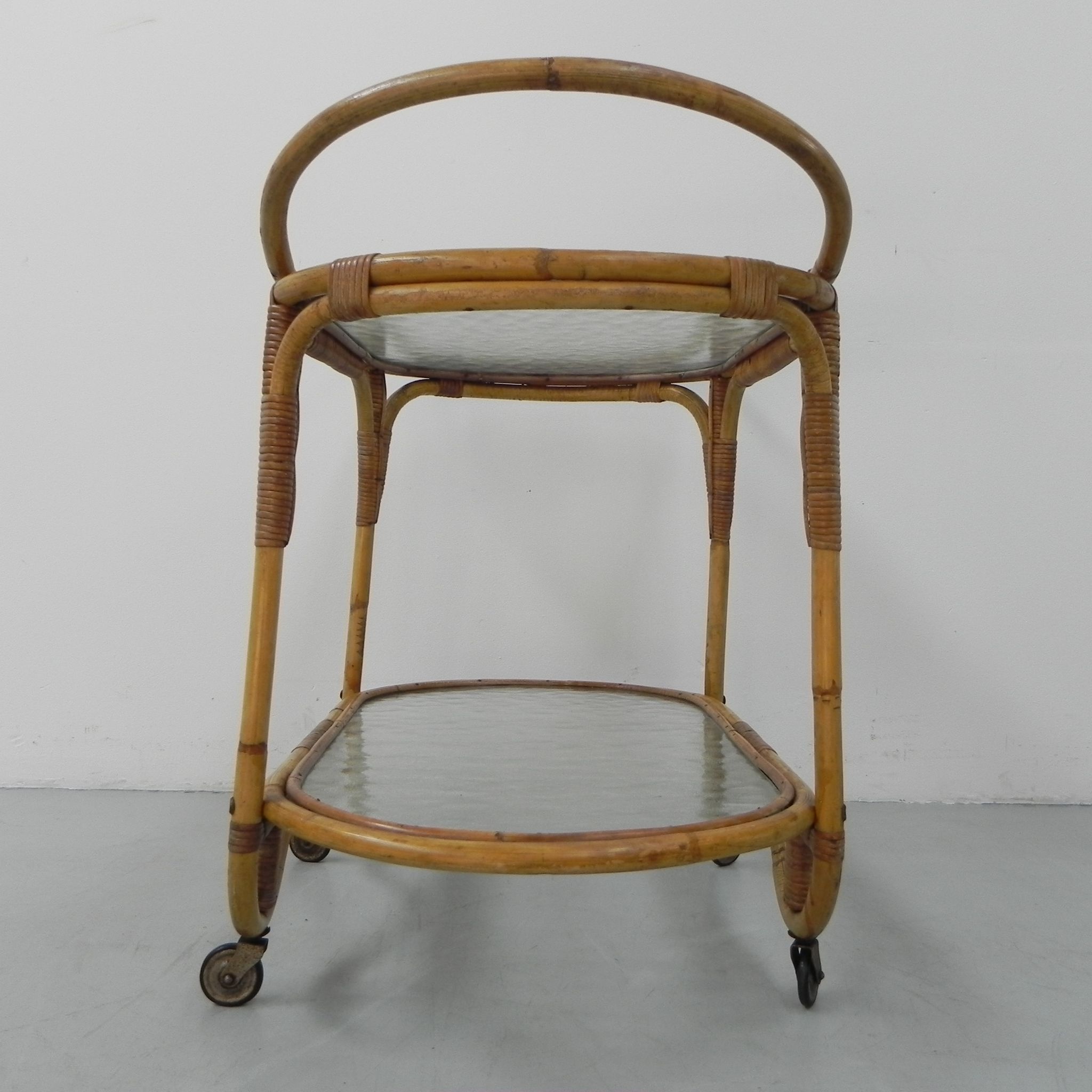 Bamboo, rattan serving trolley on castors