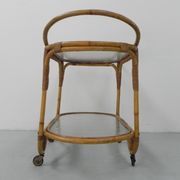 Bamboo, rattan serving trolley on castors