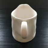 White pitcher streaked in relief