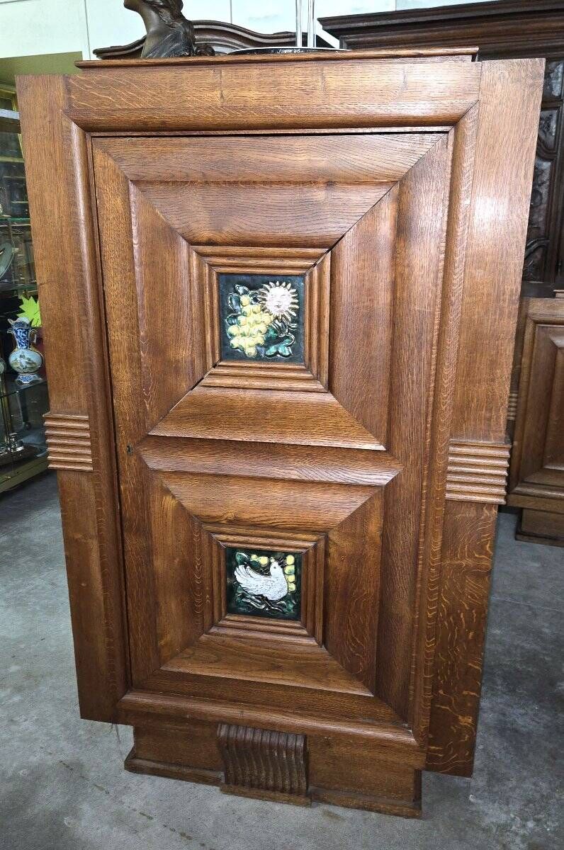 According to Maxime Old: decorative furniture in oak and ceramic from the Art Deco period (B)