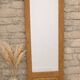 Restored old wardrobe door in a cheval mirror / freestanding mirror.