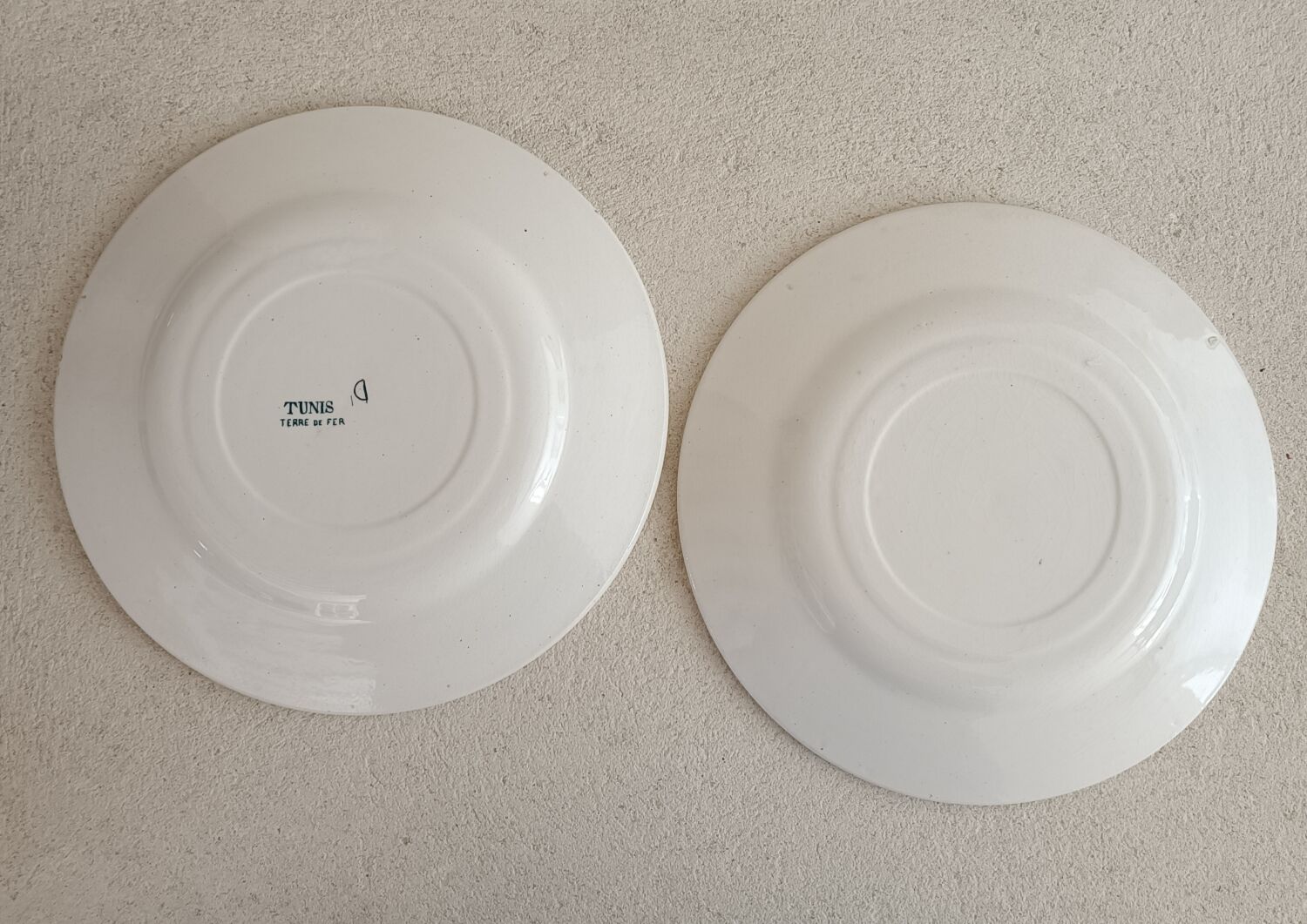 2 plates and a Longwy iron earth dish