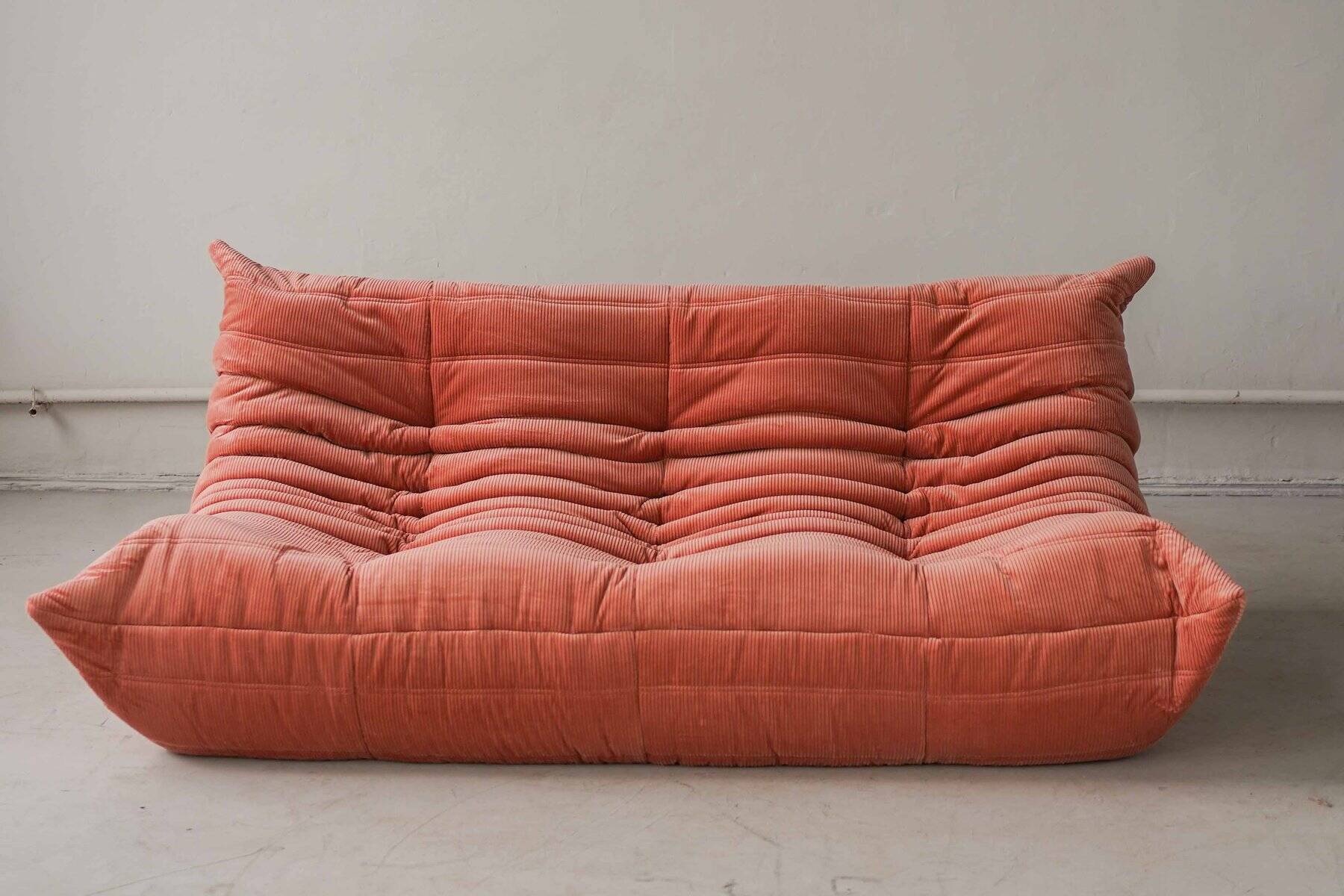 Coral corduroy Togo three-seat sofa by Michel Ducaroy for Ligne Roset