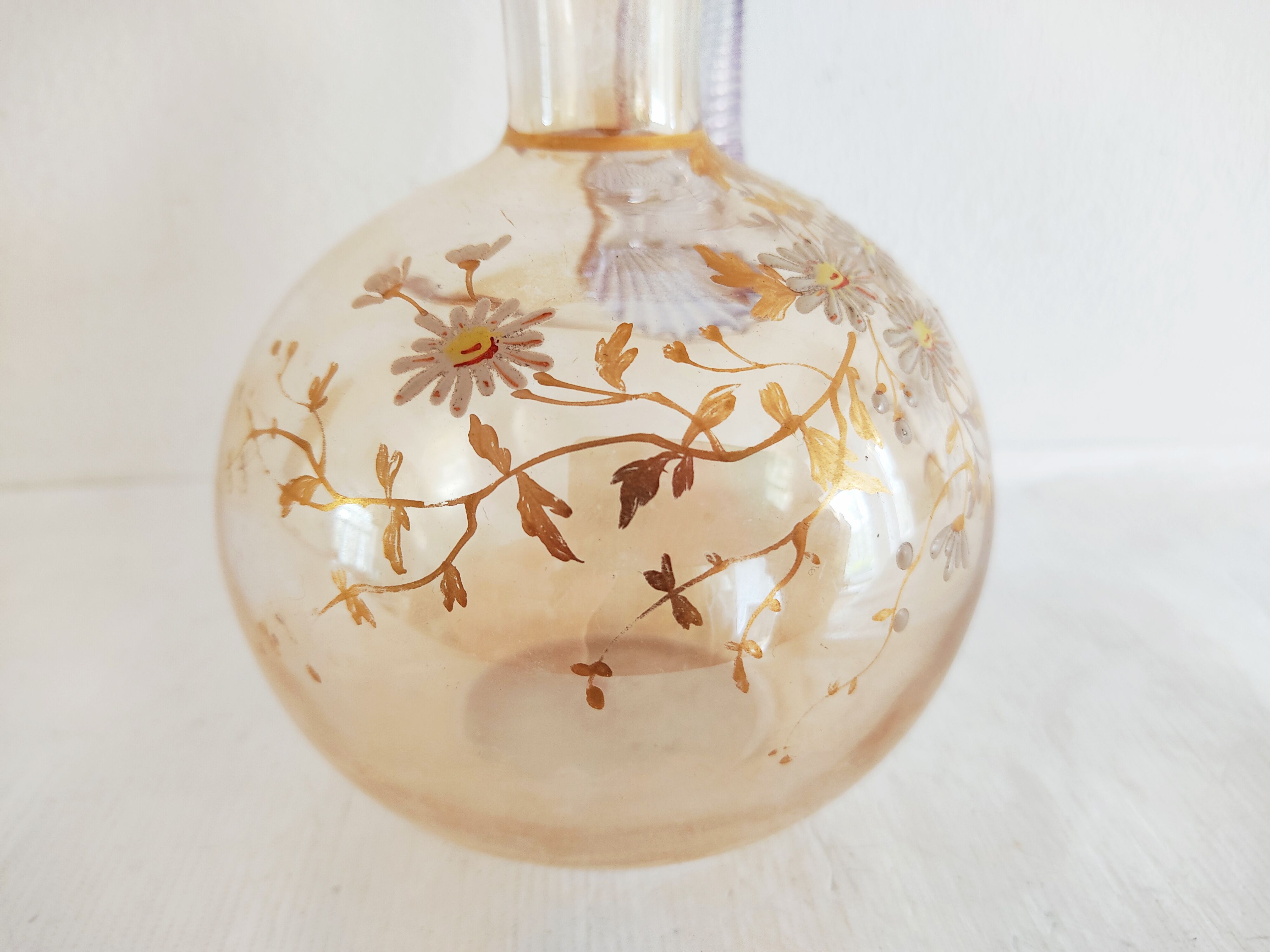 Glass pitcher decorated with 19th century flowers