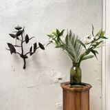 Wall lamp in wrought iron.