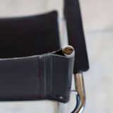 Cantilever armchair in chromed metal and black leather, 1970