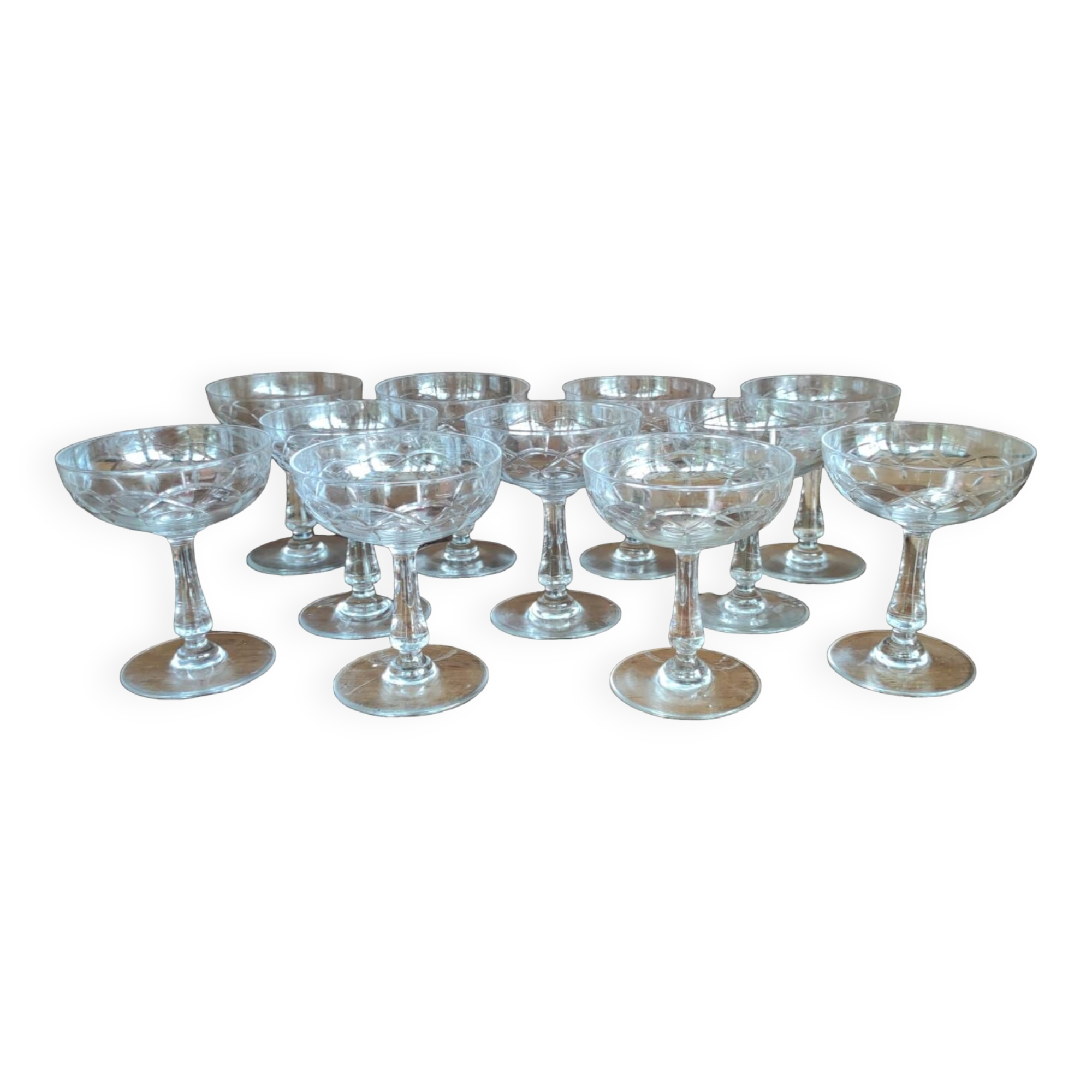 Series of 11 cut crystal champagne glasses