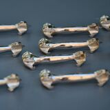 12 silver-plated cat knife rests